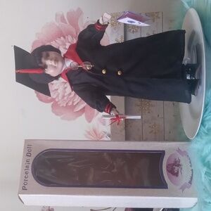 Porcelain doll graduated doll new